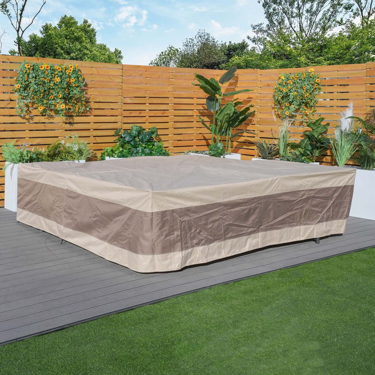 Outdoor sectional sofa cover over patio seating, beige draped