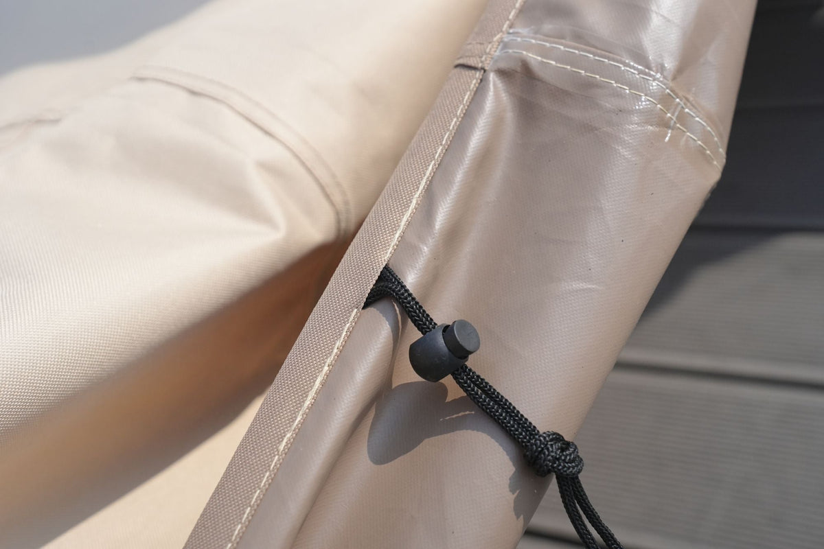 Beige patio sofa cover tie cord with adjustable toggle on corner