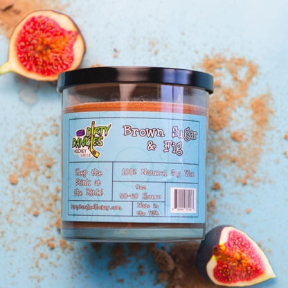 Hockey candle in clear jar with brown wax, “Brown Sugar & Fig” label