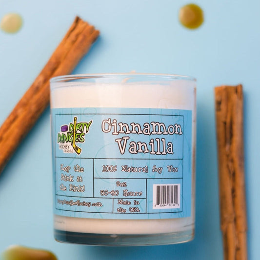 Dirty Dangles hockey candle, Cinnamon Vanilla scent, glass jar with blue label