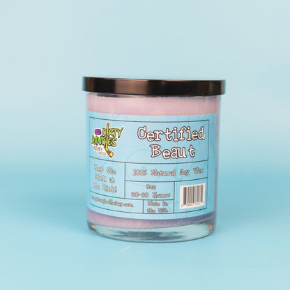 Lavender-pink candle jar with black lid and front label, 100% soy wax text