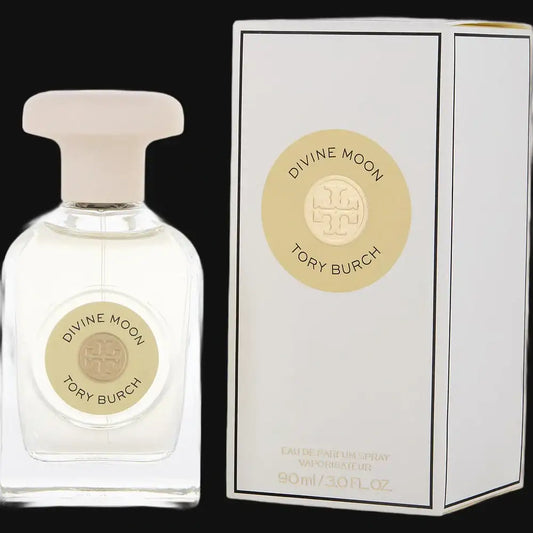 Divine Moon by Tory Burch perfume bottle with pale gold round label, box beside it