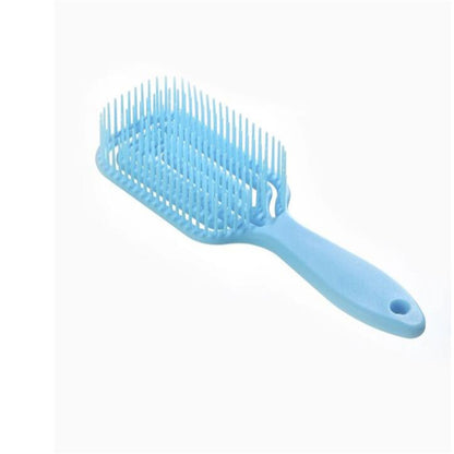 Blue massage hair comb with curved handle and dense plastic bristles
