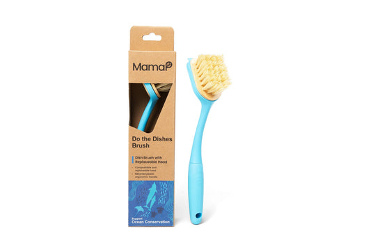 Dish brush with blue handle and light yellow bristles, shown in product packaging