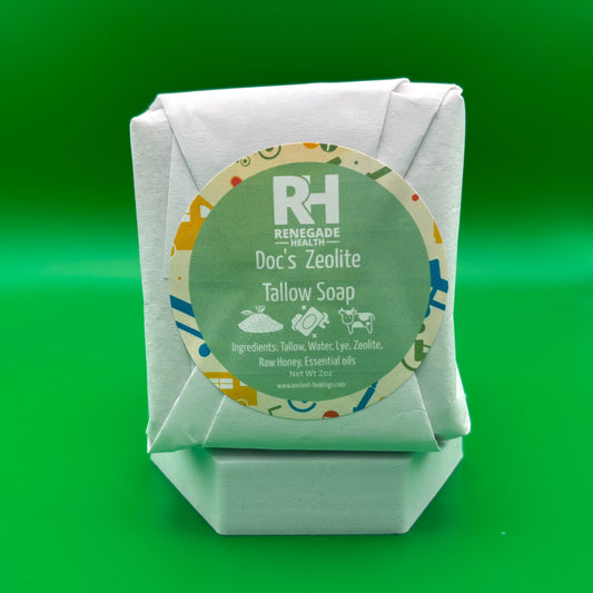 Tallow soap bar in branded paper wrap with green circular label