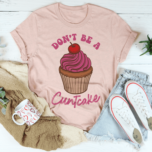 Peach crewneck T-shirt with cupcake graphic and 'Don't Be A Cuntcake' text