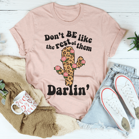 Peach T-shirt with cactus floral graphic and 'Darlin'' slogan