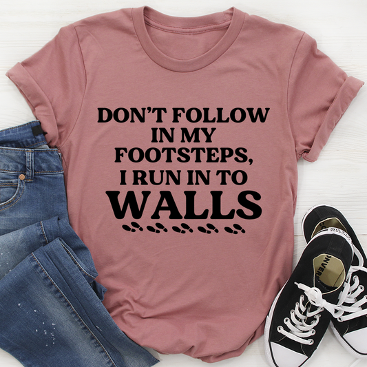 Mauve crew-neck T-shirt with bold “Don’t follow…” slogan graphic