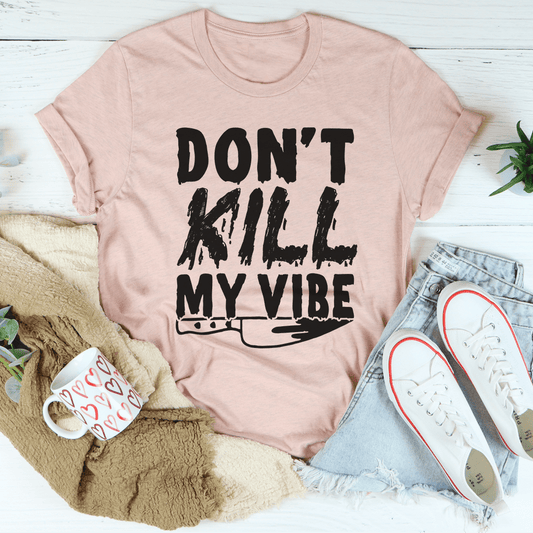 Heather peach T-shirt with “DON'T KILL MY VIBE” front graphic