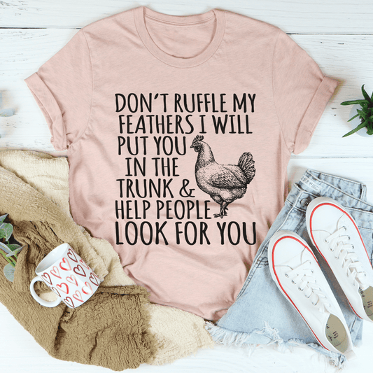Dusty pink crew-neck short-sleeve T-shirt with black rooster graphic and slogan front.