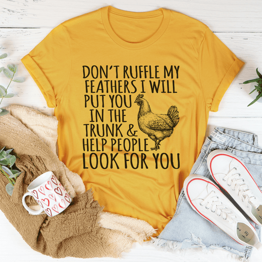 Mustard yellow crew-neck short-sleeve T-shirt with black rooster graphic and slogan front.