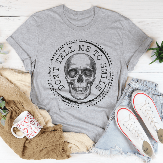 Heather gray T-shirt, crew neck, with round skull graphic and circular text.