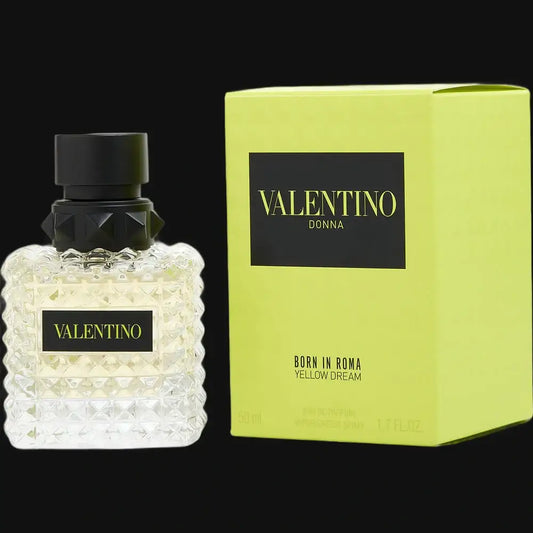 Yellow perfume box and bottle with Valentino Donna label, black cap