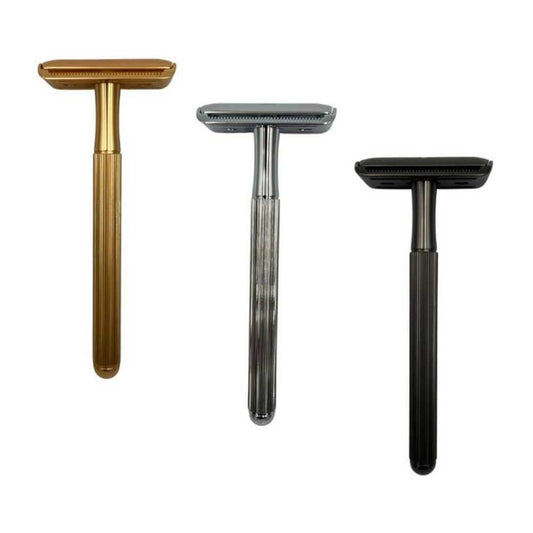 Double-sided safety razors in silver, gold, and black with textured heads