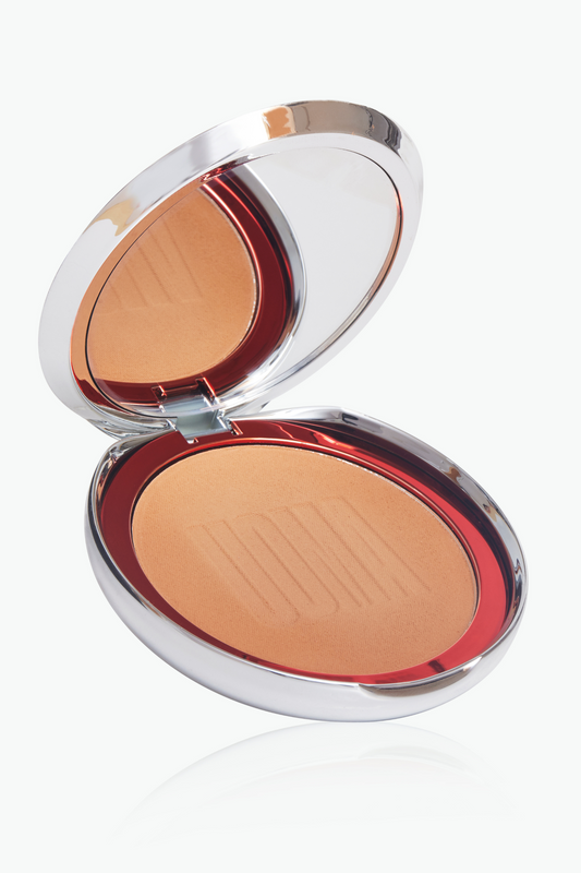 Bronzing and sculpting powder compact, open to show light tan powder pans