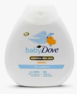 Baby Dove baby lotion bottle with blue duck graphic, white bottle