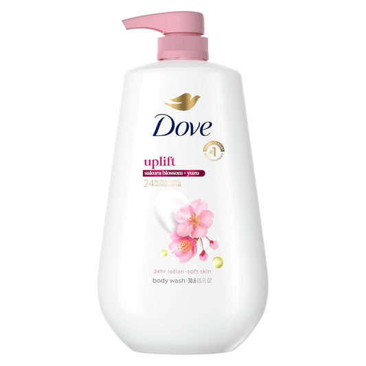 Dove Sakura body wash bottle with pink pump; white bottle and pink blossom label.