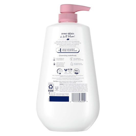 Dove Sakura body wash bottle back view with pink pump; white bottle and label info.