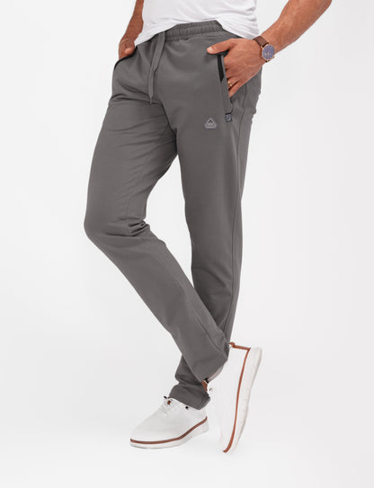 Dark gray tapered athletic sweatpants, elastic waist, side pockets, ankle cuffs