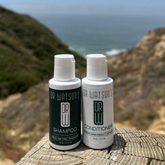 Dr. Watson's shampoo and conditioner sample bottles, white caps, black and green labels