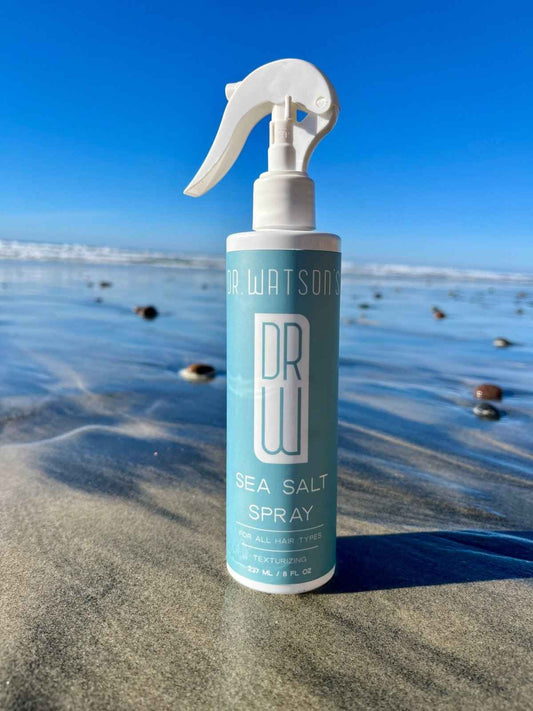 Sea salt spray bottle front view with white trigger sprayer, light blue label
