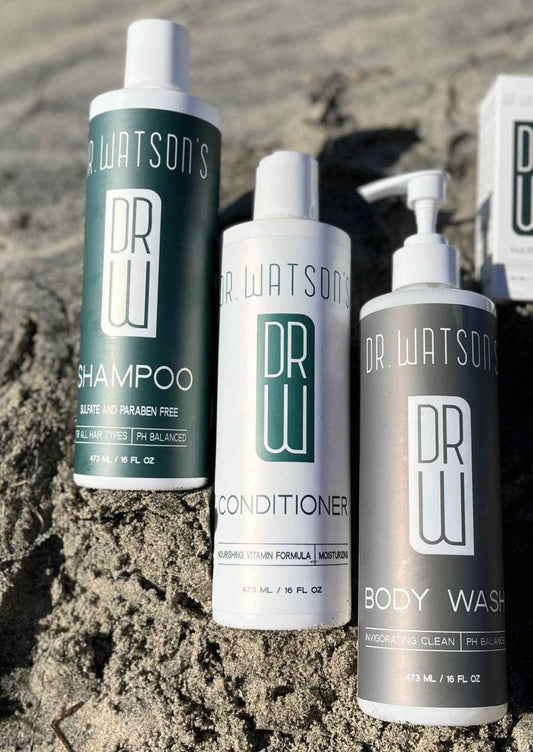Trio of pump bottles: shampoo, conditioner, and body wash with DR WATSON'S labels