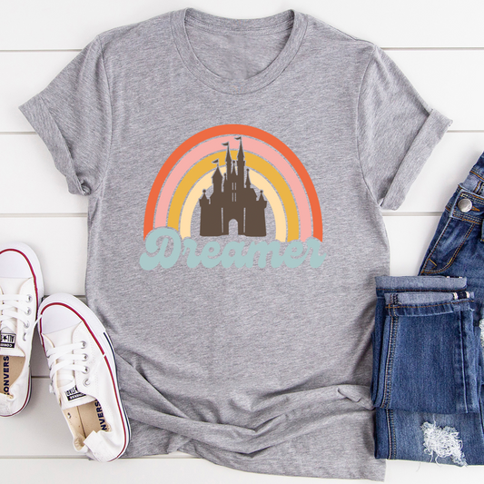 Heather gray crew-neck T-shirt front view with castle rainbow “Dreamer” print