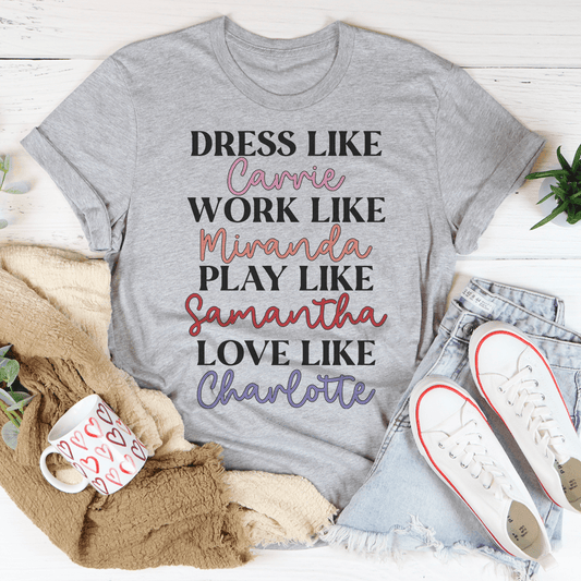 Heather gray crewneck T-shirt with centered multicolor 'Dress Like' slogan graphic
