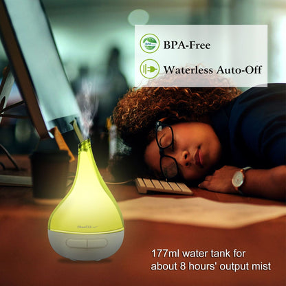 Green drop-shaped humidifier aroma diffuser emitting mist, white base with control button