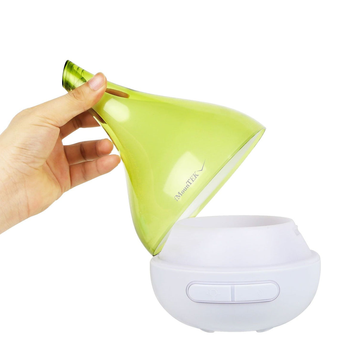 Green drop-shaped humidifier aroma diffuser held by hand, white base visible