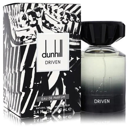 Eau de parfum cologne bottle with black cap, shown with patterned gift box