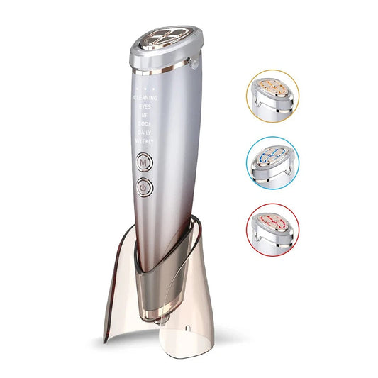 Silver EMS facial massager with circular treatment head and side control buttons