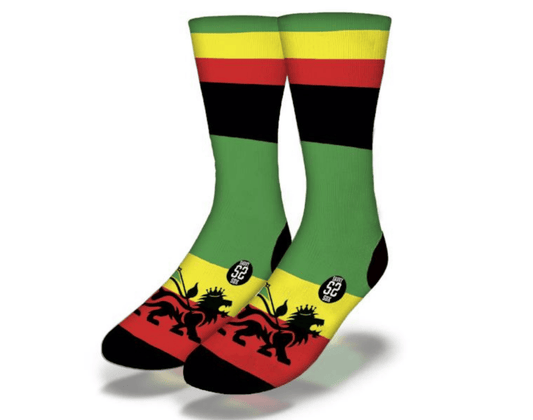 Rasta flag crew socks with black toe/heel, green leg, yellow top bands, and lion print