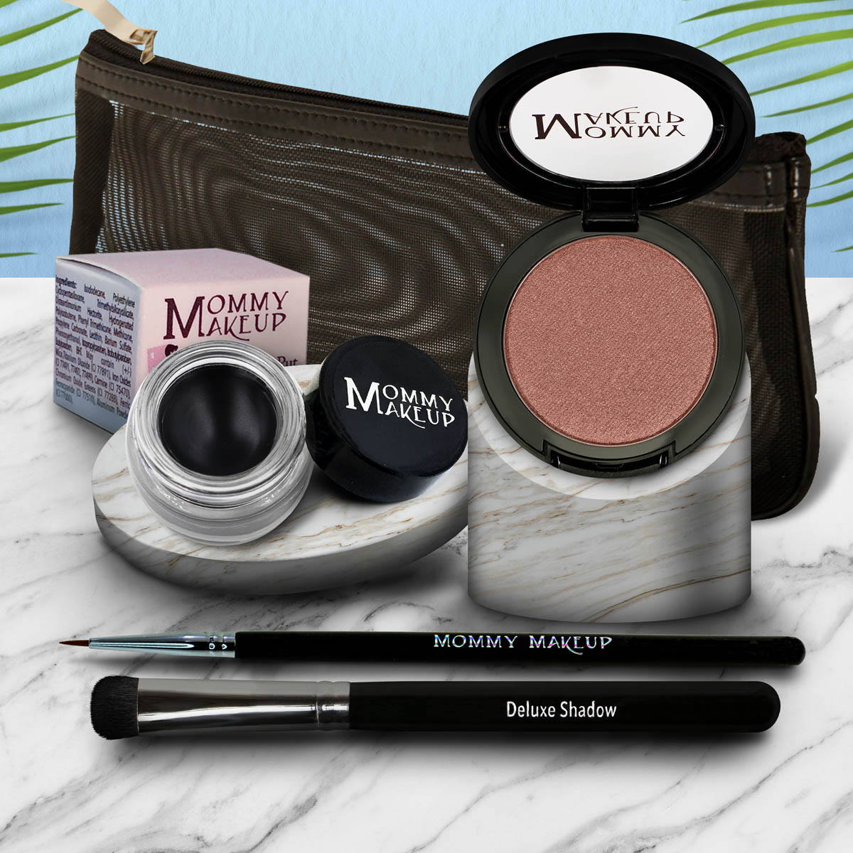 Eyelook set with pink eyeshadow pan and black gel pot, plus brush and eyeliner pen.