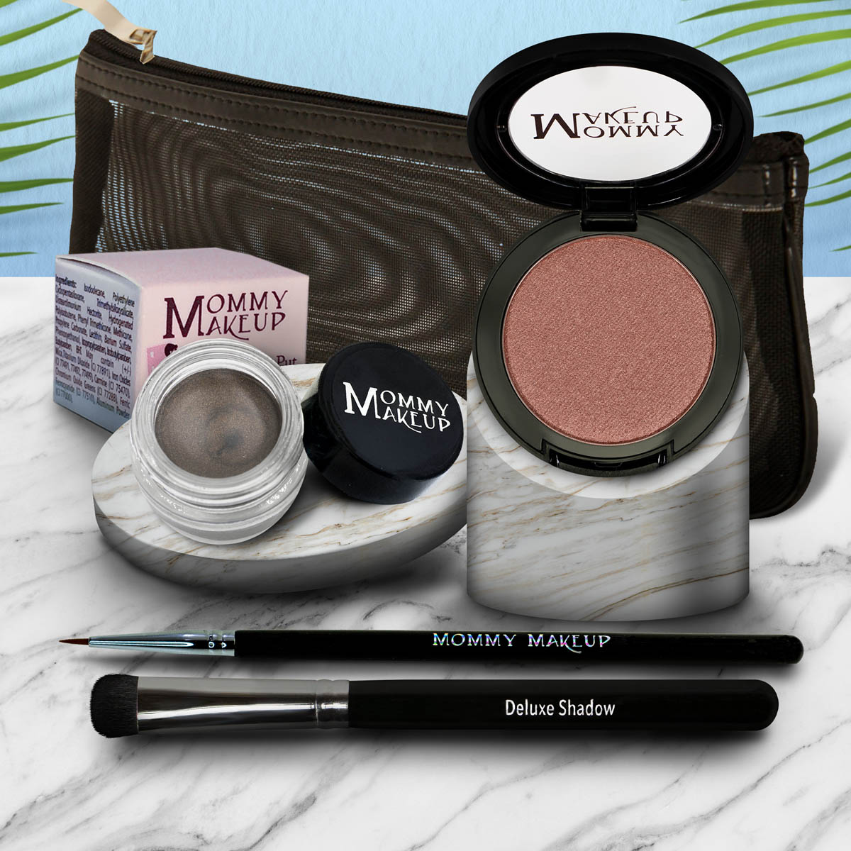 Eyelook set with pink eyeshadow pan and light gray gel pot, plus brush and eyeliner pen.