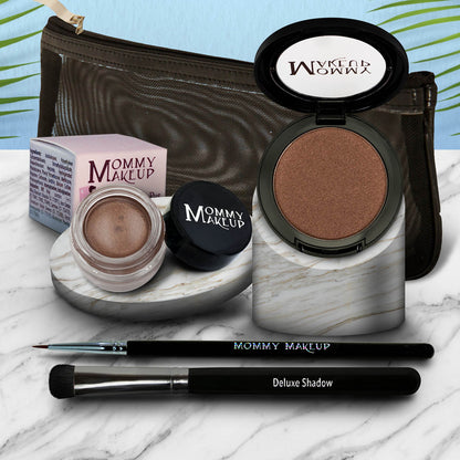 Eye makeup set with bronze shimmer eyeshadow pan, dark brush, and brown gel pot