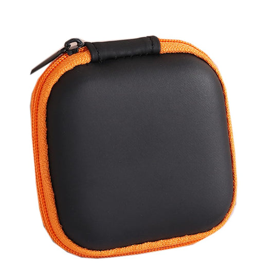 Mini EVA earbud carrying case with zipper, black shell and orange trim