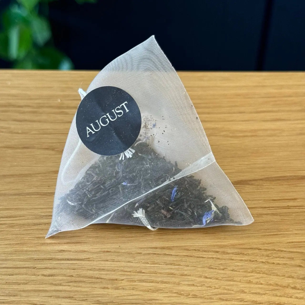 Earl Grey black tea bag sachet with round August seal
