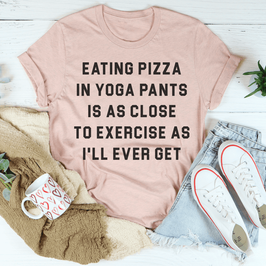 Peach crewneck T-shirt with black 'EATING PIZZA' quote graphic
