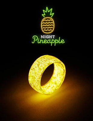 Yellow luminous resin ring with wide open band, warm glow.