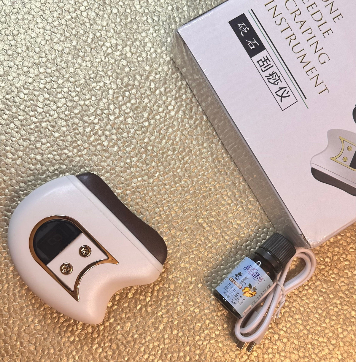 Electric gua sha facial sculpting device with charging cable and product box
