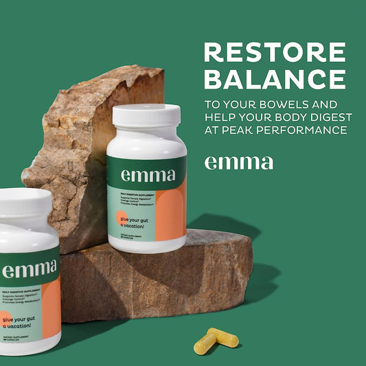 Gut health supplement bottle with white cap and green label on stone block