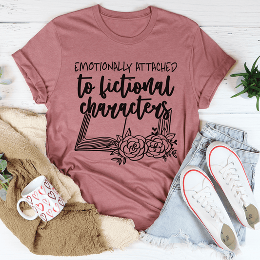 Mauve crewneck T-shirt with black quote and floral line-art graphic on front