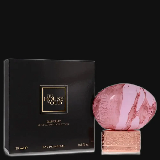Unisex eau de parfum box and bottle set with gold logo and pink glass bottle