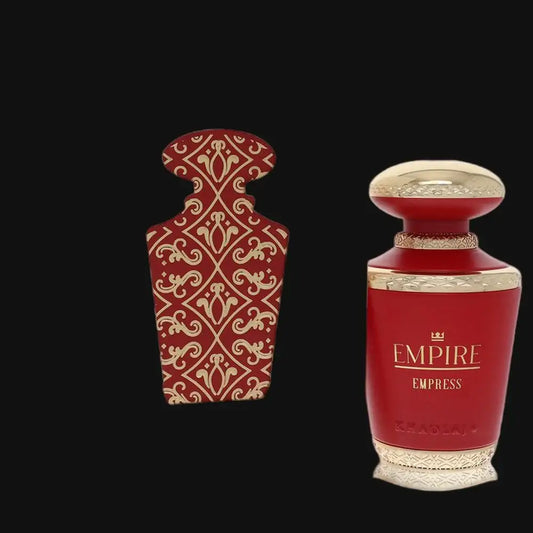 Red women's perfume bottle with gold cap and decorative stopper