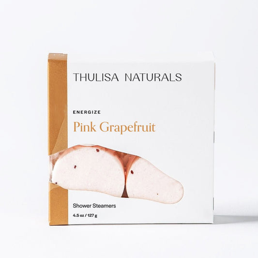 Shower steamer pack, Pink Grapefruit, with two pale round tablets in white box