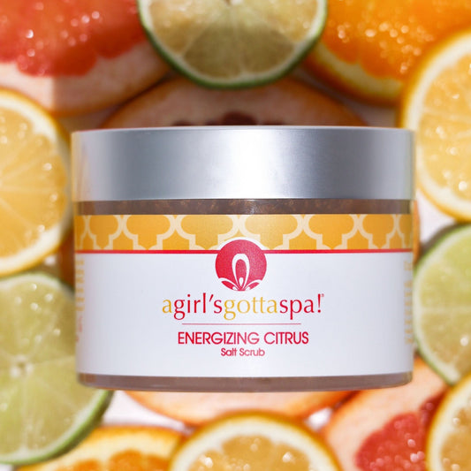 Body scrub jar with orange patterned band and printed label