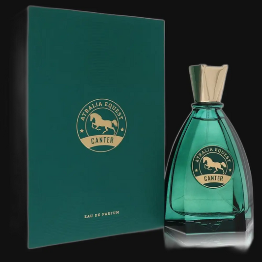Teal glass perfume bottle with gold logo, shown with matching green gift box