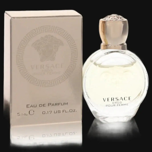 Versace Eros eau de parfum bottle with gold-toned cap, clear pale liquid