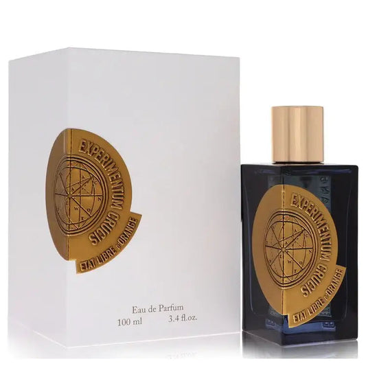Unisex Eau de Parfum bottle with gold cap and dark glass, in white box